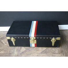 This very nice little Louis Vuitton motor trunk in black canvas, features stamped Louis Vuitton solid brass locks and studs and leather and brass side handles. It wears customized painted stripes to add an extra touch of personality.  Its interior is all original with its original lining, its Louis Vuitton label, its serial number. The bottom of its interior has been relined a while ago. Although there are a couple of little stains, it is rather clean, given its age and there is no smell.  Under Painted Stripes, Leather And Brass, Paint Stripes, Black Canvas, Trunk, Solid Brass, Handles, Louis Vuitton, Stripes