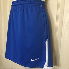 Nike Lacrosse Skirt. Elasticized Waist And Pull Cord. Length 15” Inches. Measurements Laying Flat : Waist 17” Inches, Hip 22” Inches. Nike Blue Skort For Spring, Sporty Short Blue Skirt, Blue Casual Sports Skirt, Casual Blue Sports Skirt, Red Tennis Skirt, Nike Skort, Nike Skirt, Nike Tennis Skirt, Nike Skirts