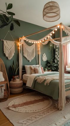 a bedroom with a canopy bed, rugs and lights on the wall above it