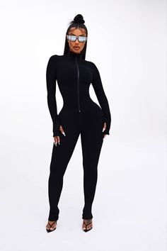 Enhance Your Figure With This Body Hugging Jumpsuit ✨ Black Stretch Jumpsuits And Rompers In Elastane, Winter Black High Stretch Jumpsuits And Rompers, High Stretch Black Winter Jumpsuits And Rompers, Black High Stretch Jumpsuits And Rompers For Winter, Black High Stretch Winter Jumpsuits And Rompers, Stretch Bodysuit With Zipper Closure, Black Stretch Unitard For Winter, Black Stretch Jumpsuits And Rompers With Zipper, Black Stretch Jumpsuits And Rompers With Zipper Closure