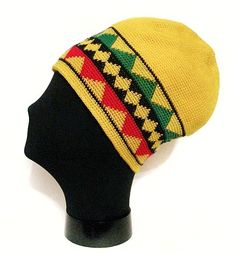 a knitted hat on top of a black mannequin head