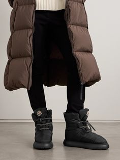 Moncler's ankle boots are cut from the same quilted shell as the brand's signature coats. They're lined in fleece for warmth and set on gripped rubber soles. Their appliquéd logo patch makes them instantly recognizable. Moncler Boots, Moncler Women, Raffia Bag, Jeans Jumpsuit, Beauty Sets, Ski Wear, Clothes Collection, Black Ankle Boots, Jeans Dress