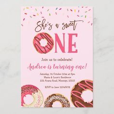 a pink birthday party card with donuts and sprinkles on the front