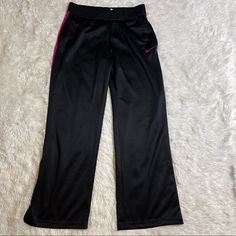 Nike Sweatpants Size Medium Black And Pink Tie And Elastic Waist Line Partial Side Zipper Legs All Measurements Are Taken With Pants Laying Flat Waist 31 Inches, Links 42 Inches, Inseam 31 1/2 Inches, Rise 11 Inches New Without Tags Never Worn Please See Photos For More Details A33 Athletic Sweatpants, Nike Sweatpants, Pink Tie, Pink Ties, Black And Pink, Nike Pants, 11 Inches, Black Nikes, Track Pants