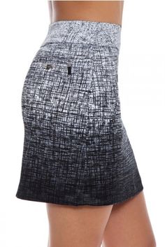 a women's tennis skirt with a black and white pattern on the bottom half