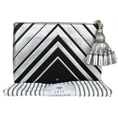 Brand Anya Hindmarch Style Clutch Bag Color / Material Silver And Black / Leather Country Of Manufacture China Serial Number - Dimension Size ( Inch ) W 11.8 X H 7.9 X D 0.4 " (Approx.) Size ( Cm ) W 30 X H 20 X D 1 Cm (Approx.) Handle Drop ( Inch /Cm ) 0 "/ 0 Cm (Approx.) Shoulder Drop ( Inch /Cm ) 0 - 0 "/ 0 - 0 Cm(Approx.) Come With ( Accessories) Dust Bag Pockets Outside - Inside Zipper*1,Card*3 Example Of Ranks S New,Unused Sa Less Frequently Used Items A There Is A Little Feeling Of Used, Anya Hindmarch, Tassel Fringe, Leather Silver, Designer Bags, Hand Bag, Bags Handbags, Leather Bag, Clutch Bag, Tassels