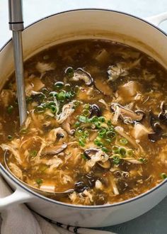 a large pot filled with soup on top of a table