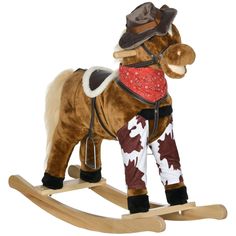 a toy rocking horse with a cowboy hat and bandana on it's back