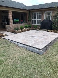 a patio being built in front of a house