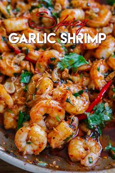 a bowl filled with shrimp and garnished with cilantro