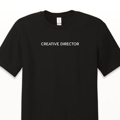 "With a minimalist design, The Creative Director Tee is excellent for any designer, illustrator, entrepreneur, business owner, creative maker, or anyone in charge of making high-level creative decisions. This lightweight crewneck is made of 100% ring spun US cotton, and has a modern classic fit. The neck and shoulders are taped for comfort and durability. Available in unisex sizing. None of that \"iron-on\" look or feel. Each garment is finished with commercial-grade heat press and vinyl." Modern Crew Neck T-shirt With Branding, Modern Short Sleeve T-shirt With Branding, Modern Cotton T-shirt With Branding, Minimalist Graphic Print T-shirt With Short Sleeves, Relaxed Fit Crew T-shirt With Graphic Design, Modern Branded Crew Neck T-shirt, Relaxed Fit Graphic Crew T-shirt, Cotton Crew T-shirt With Branding, Modern Branded Short Sleeve T-shirt