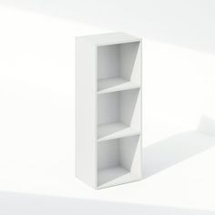 a white book shelf with three shelves on each side and one section missing from the wall