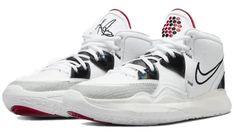 a pair of white and black sneakers with red accents on the upper part of the shoe