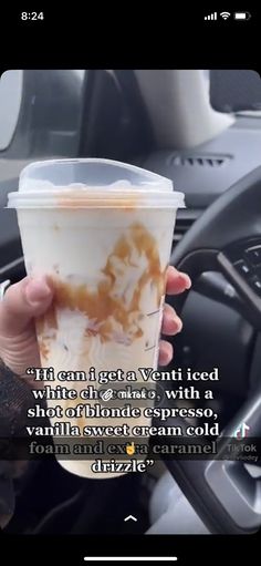 someone holding up a cup of coffee in their hand with the caption on it