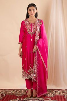 Fuchsia pink straight kurta featuring sequin, bead, floral and tassel embroidery with scallop hem. Paired with a solid pant and embroidered scallop hem dupatta. - Aza Fashions Pink Silk Salwar Kameez With Mirror Work, Pink Embroidered Party Kurta, Pink Kurta With Resham Embroidery In Chinon, Pink Chinon Kurta With Resham Embroidery, Pink Chinon Salwar Kameez For Reception, Pink Straight Kurta For Party, Pink Gota Work Salwar Kameez For Reception, Unstitched Pink Embellished Traditional Wear, Pink Salwar Kameez With Gota Work For Reception