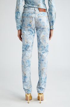 A pretty paisley print lends signature flourish to a pair of skinny jeans done in stretch-enhanced denim for maximum comfort. 34" inseam; 14" leg opening; 9" front rise; 15" back rise (size 29) Zip fly with button closure Five-pocket style 97% cotton, 3% elastane Machine wash, line dry Made in Italy Designer Clothing Luxury Blue Bottoms With Five Pockets, Fitted Denim Floral Print Bottoms, Luxury Fitted Denim Bottoms, Fitted Bottoms With Paisley Print For Spring, Fitted Paisley Print Bottoms For Spring, Mid-rise Fitted Floral Print Pants, Fitted Paisley Print Pants For Spring, Fitted Paisley Print Spring Pants, Luxury Straight Leg Jeans For Spring