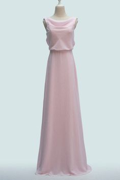 a long pink dress on a mannequin