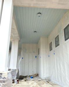 the inside of a house being painted white