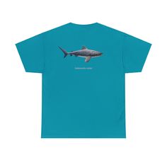 "Dive into the deep with our Tiger Shark Tee, A tribute to the ocean's wild majesty. With stripes of power, it prowls the deep blue, A symbol of strength, fierce and true. Printed in vivid colors, our design's a delight, Wear it proudly, day or night. Join the realm of the tiger shark's domain, With this tee, your style will reign!" The unisex heavy cotton tee is the basic staple of any wardrobe. It is the foundation upon which casual fashion grows. All it needs is a personalized design to elevate things to profitability. The specially spun fibers provide a smooth surface for premium printing vividity and sharpness. No side seams mean there are no itchy interruptions under the arms. The shoulders have tape for improved durability. .: Made with medium fabric (5.3 oz/yd² (180 g/m²)) consisti Relaxed Fit Blue Tops For Surfing, Blue Relaxed Fit Tops For Surfing, Blue Relaxed Fit Top With Back Print, Blue Graphic Tee With Front And Back Print, Blue Surfing Tops With Screen Print, Blue Crew Neck T-shirt With Front And Back Print, Blue Short Sleeve Top With Shark Design, Blue Shark Design Short Sleeve Tops, Blue Shark Design Crew Neck Top