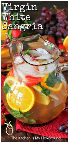 a pitcher filled with ice and lemon slices