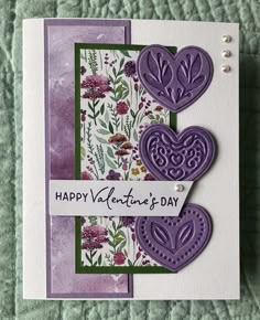 a handmade valentine's day card with hearts and flowers