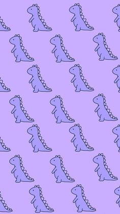 a purple background with small blue dinosaurs on it's back and sides, all facing different directions