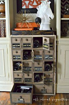 an old dresser with many drawers in it