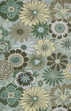 an area rug with flowers and leaves in green, blue, yellow and brown colors