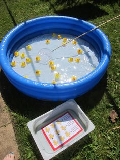 an inflatable swimming pool with rubber ducks