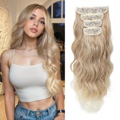 Introducing the "Sandy Shores Blend" from The HairCube Beach Wave Extension Collection: a mesmerizing mix of Vanilla Blonde, Sandy Blonde, Silver Blonde, and Ombré Blonde. This exquisite set of hair extensions captures the essence of a sun-drenched beach escape, blending these four luminous shades to create a seamless, multi-dimensional look that shines with the sunniest highlights and deepest lowlights. Each strand is meticulously crafted to embody the free-spirited, carefree vibe of a beach day, wavering between gentle curls and soft, tousled waves that look effortlessly natural. The 4-clip system ensures a secure and comfortable fit, making it easy to add instant volume and length that blends beautifully with your natural hair. Perfect for those who want to evoke a sense of summer all y Ombré Blonde, Vanilla Blonde, Blonde Silver, Beach Wave Hair, Detangler Spray, Sandy Blonde, Beach Wave, Tousled Waves, Silver Blonde