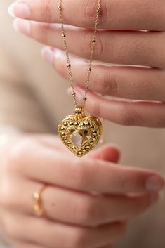 The Wishing Locket Collection is made up of beautiful handcrafted gold vermeil lockets, suspended on gold vermeil chains.  Each Wishing Locket can be filled with a personalised note - a wish, affirmation, vow, mantra, prayer or even a secret message from a loved one. Ever-present, the wearer holds the locket close to their heart. Choose from a selection of messages, or place something of your own in the locket of your choosing. We love the idea that putting a message out into the universe will h Luxury Medallion Locket Necklace For Gift, Luxury Medallion Locket Necklace As Gift, Luxury Medallion Locket Necklace Gift, Gold Heirloom Jewelry With Heart Charm, Heirloom Gold Jewelry With Heart Charm, Gold Necklaces With Detachable Pendant For Keepsake, Victorian Necklace With Detachable Pendant For Gift, Gold-plated Gold Locket Necklace Pendant, Luxury Gold Locket Necklace Gift