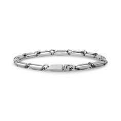 This solid link bracelet features full steel links 13mm x 5mm to create a modern yet timeless design. Perfect for stacking with other bracelets or wearing alone, its heavy weight ensures it stays securely in place. With simple yet sophisticated details, this bracelet will elevate any look. Classic Stainless Steel Oval Link Bracelet, Classic Link Bracelets With Solid Link Construction, Stainless Steel Link Bracelets For Formal Occasions, Classic Metal Bracelets With Rectangular Links, Timeless Everyday Bracelets With Stainless Steel Clasp, Modern White Gold Bracelet With Stainless Steel Clasp, Modern Silver Cuban Link Bracelet, Classic Cuban Link Metal Bracelet, Classic Metal Cuban Link Bracelet