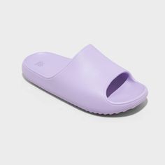 Robbie slide sandals from Wild Fable™ in light purple with a contoured footbed. Made of plastic with a wide vamp band, an open D-toe and a no-heel design. Slip-on style with a backless silhouette completes the look and allows for easy on and off. If you’re not satisfied with any Target Owned Brand item, return it within one year with a receipt for an exchange or a refund. Wild Fable™: A look for every story. Purple Slides, Vamps Band, Beach Socks, Pretty Shoes Sneakers, Plastic Heels, Shoe Wishlist, Plastic Shoes, Heel Design, Denim Accessories