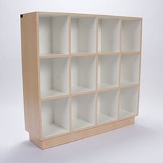 an empty bookcase is shown on a plain white background with no people around it