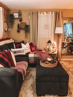 a living room filled with furniture and a flat screen tv