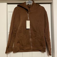 Free Island Brown Sweatshirt Hoodie In Size Extra Extra Large. Long Sleeves Front Zipper Two Pockets Attached Hood Brown Fleece Hooded Top, Brown Long Sleeve Sweatshirt With Adjustable Hood, Brown Hooded Fleece Top, Casual Brown Sweatshirt With Adjustable Hood, Casual Brown Hooded Sweatshirt, Casual Brown Top With Kangaroo Pocket, Brown Hooded Top With Ribbed Cuffs, Brown Hooded Top With Kangaroo Pocket, Brown Hoodie Top With Pockets