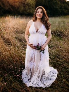 Size Chart Size US Bust (cm) Waist (cm) Length (cm) S 4 86 76 138 M 8 90 80 140 L 12 94 84 142 XL 14 98 88 144 Details A boho maternity dress features white lace with champagne lining, elastic waistband, and adjustable shoulder straps. Favorite: Perfectly adapts to such as beaches and parks. Bump: Elegant cut to highlight your pregnant belly. Comfort: Lace material that fits like a glove. Stages: Elastic waist design, adaptable for all stages of pregnancy. Beach Maternity Photography, Maternity Photoshoot Dress, Gender Reveal Outfits, Maternity Photography Beach, Boho Maternity Dress, Maternity Sundress, Photoshoot Style, Embroidery Tulle