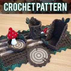 a crochet pattern with two boots and a mushroom on the top, sitting on a table