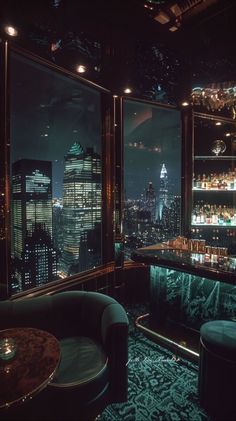 a dimly lit bar overlooking the city skyline at night with high rise buildings in the background