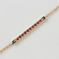 A timeless piece to sparkle on any occasion. The Andrea boasts beauty with the union of encrusted rubies and fine gold. Easy to layer and stack with other bracelets, or dazzle alone. All features can be customized! Please contact us if you wish to make changes, we love making custom designs. All of our jewelry is carefully handmade in our atelier. *HC diamond are all conflict-free diamonds To order by phone 972-72-2991000 Luxury Stackable Ruby Jewelry, Gold Ruby Jewelry With Pave Setting, Luxury Red Stackable Jewelry, Yellow Gold Ruby Diamond Jubilee Bracelet, Red Pave Setting Jewelry Gift, Red Pave Setting Jewelry For Gift, Red Ruby Diamond Bracelet Gift, Red Ruby Jewelry With Single Cut Diamonds, Yellow Gold Ruby Bracelet