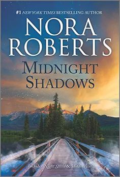 the cover of midnight shadows by nora roberts, with mountains and trees in the background