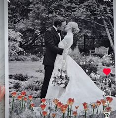 a man and woman are kissing in front of flowers with the caption that reads, i love you