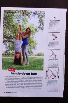 a woman doing hands - down exercises on the grass with another woman standing behind her