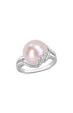 A polished sterling silver ring features a pink cultured freshwater pearl accented by dainty diamonds for luxurious shine. Pearl size: 12–12.5mm Total diamond weight: 0.05ct. Color: G–H Clarity: I3 Sterling silver/cultured freshwater pearl/diamond Imported Diamond Guide Elegant Pink Pearl Round Ring, Pink Pearl Ring, Pearl Diamond Ring, Pearl Rings, Pearl And Diamond Ring, Diamond Guide, Pearl Diamond, Pink Pearl, Pearl Size