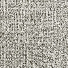 the texture of an upholstered carpet is shown in grey and white colors, as well as black dots