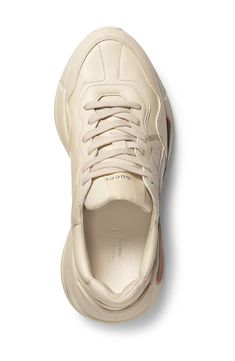 Featuring an interlocking G-logo and classic stripe motif inspired by an '80s-era design, this layered, retro-cool sneaker is boosted by a super chunky sole. Style Name:Gucci Rhyton Logo Sneaker (Women). Style Number: 5633696. Available in stores. Sporty Gucci White High-top Sneakers, White Sporty Gucci High-top Sneakers, Gucci White High-top Sneakers Sporty Style, Gucci White Sporty High-top Sneakers, Gucci Sporty High-top Sneakers, Gucci Leather Low-top Platform Sneakers, Gucci Sporty High-top Sneakers For Streetwear, Gucci Leather Platform Sneakers, Gucci Low-top Platform Sneakers With Branded Insole