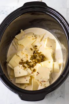 the food in the crock pot is ready to be cooked