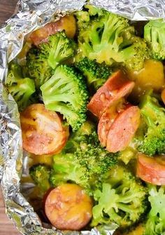 broccoli and sausage covered in tin foil