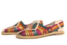 Women's Huarache Sandals - Multi #2 A colorful masterpiece -- handwoven to look stylish while keeping the authentic feel and look.  - Leather uppers - Slightly cushioned inner sole - Durable rubber outer sole - Closed Toe Multicolor Handmade Huarache Sandals For Festivals, Multicolor Handmade Huaraches For Festival, Festival Multicolor Handmade Huaraches, Handmade Multicolor Festival Huaraches, Artisan Multicolor Handmade Huaraches, Multicolor Open Toe Huaraches For Festival, Artisan Multicolor Huarache Sandals For Summer, Multicolor Leather Huarache Sandals For Fiesta, Multicolor Leather Huaraches For Festival