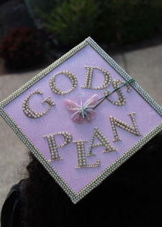 graduation cap idea: God's plan Inspo For Graduation Caps, Still Clueless Grad Cap, Haitian Cap Decoration Graduation, Caps And Gowns Decoration, Drake Inspired Graduation Caps, Best Graduation Cap Ideas, Boujee Graduation Cap, Graudtion Caps Aesthetic, Grad Cap Ideas Drake